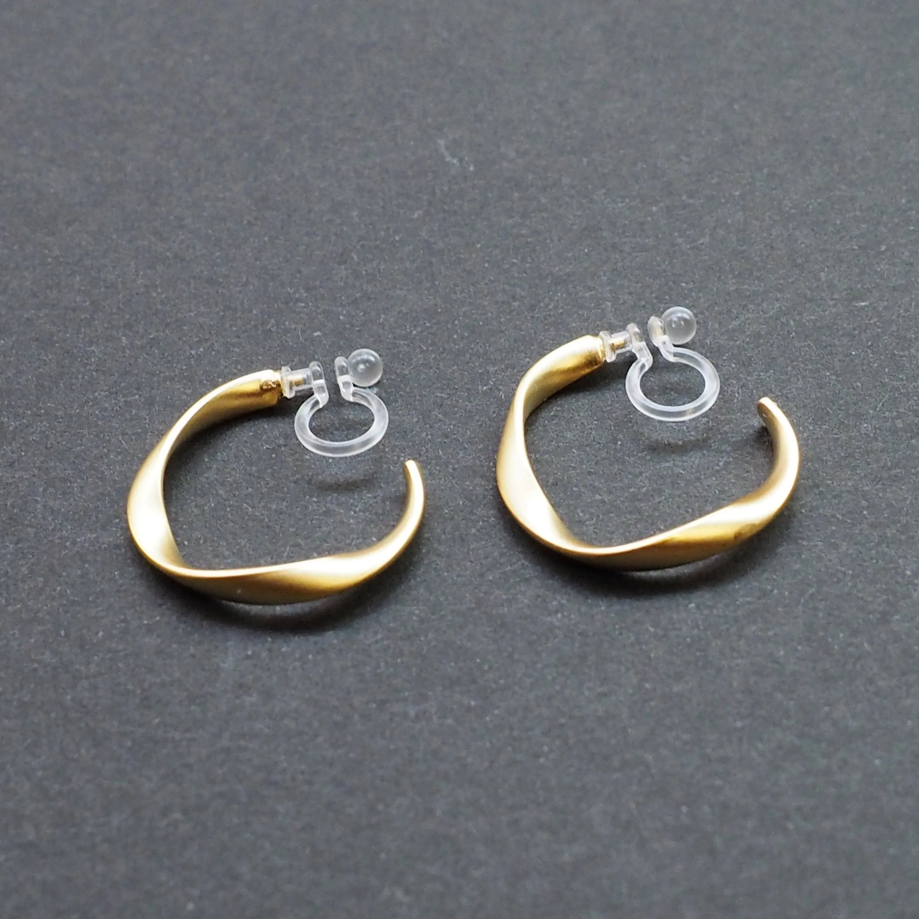 Gold Twisted Invisible Clip On Hoop Earrings