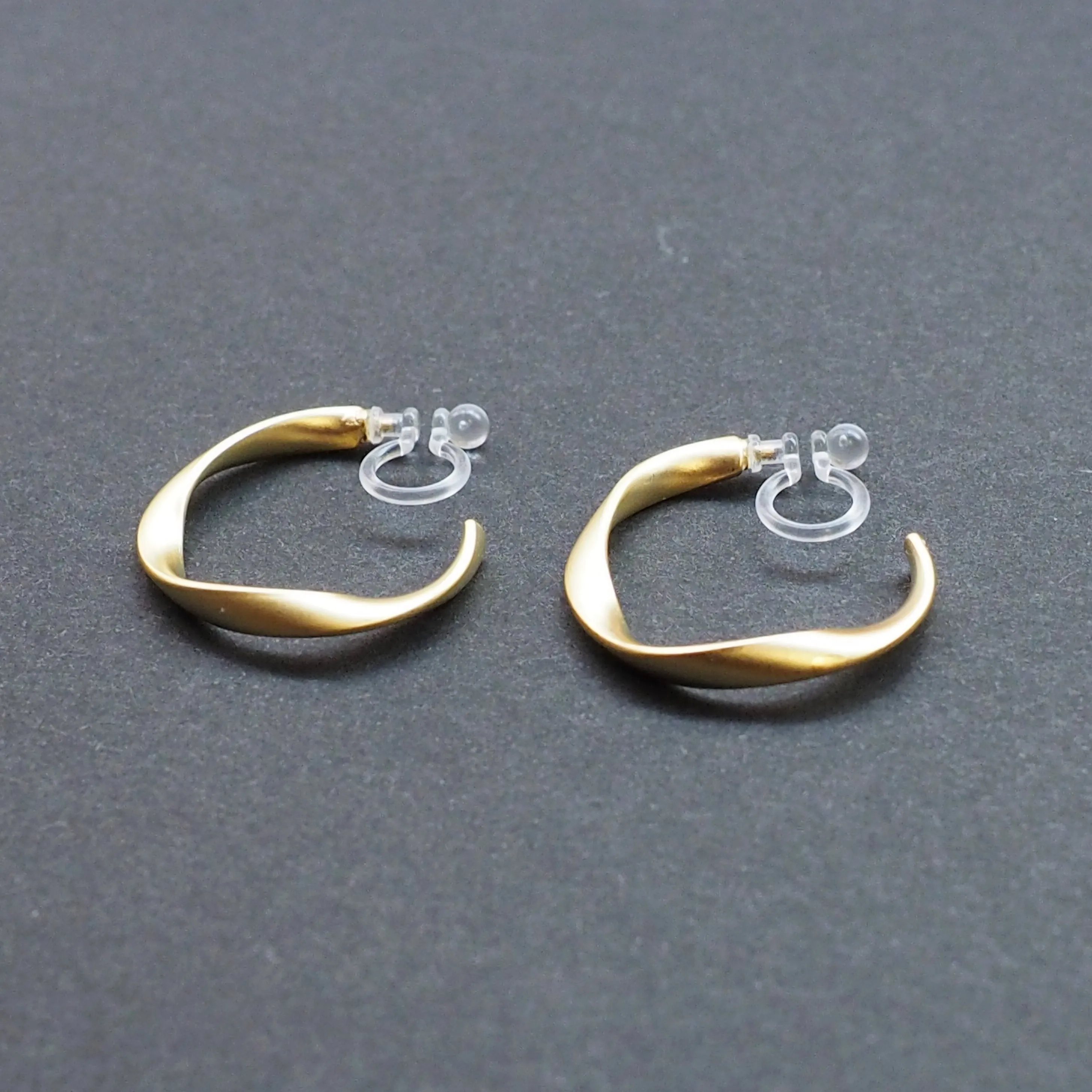 Gold Twisted Invisible Clip On Hoop Earrings